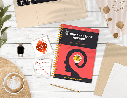 The Story Snapshot Method workbook on a desktop